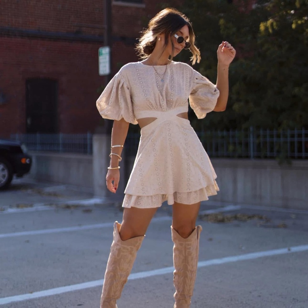 Elegant Cream Dress with Cut-Out Details